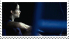 Gif stamp of Katniss in one of the Hunger Games movies drawing her bow